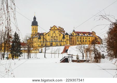Belarusian Attraction Nesvizh Castle Covered With Snow In The Winter Season.