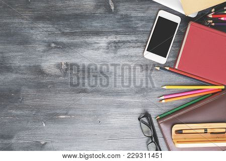 Top View Of Contemporary Wooden Workplace With Copy Space And Various Items. Work Place And Style Co
