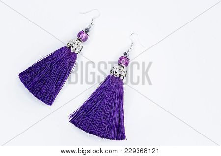 Purple Handmade Earrings On White