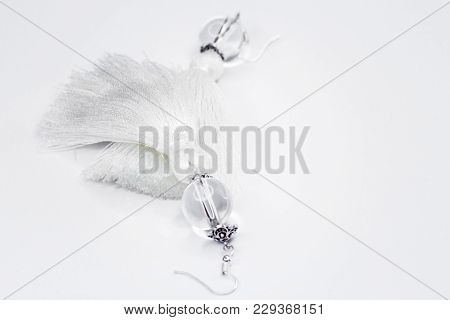 White Handmade Earrings-tassels On A White Background.