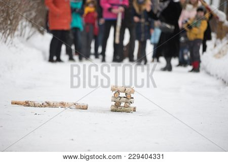 Russian Holiday Seeing Off Winter Maslenitsa.national Russian Game Gorodki