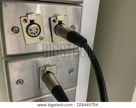 Close Up Of Plug Xlr On The Wall