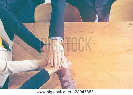 Partners Team Work Joining Hands To Success Together.  Business Team Stack Of Hands For Star Up Proj