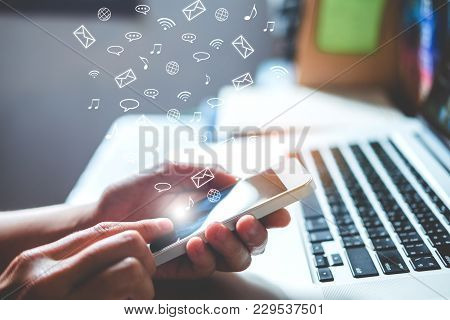 Man Using Mobile Online  Icon Social Networking Connection On Screen