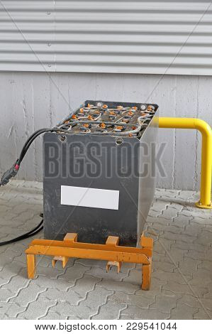 Charging Big Lead Acid Battery For Forklift In Warehouse