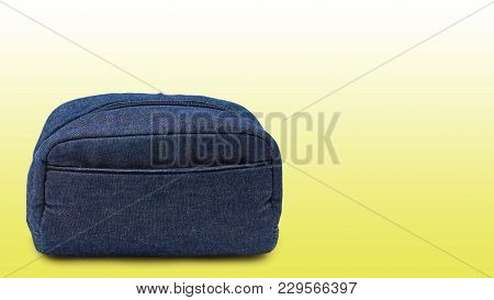 Blue Jeans Bag On Yellow Color Background.