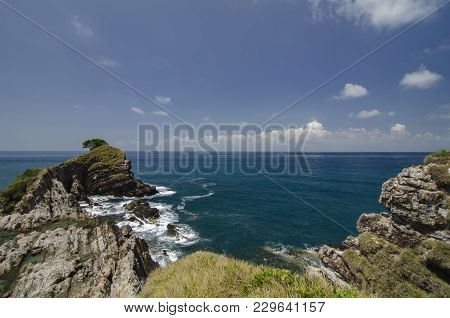 Hidden Beauty Of Kapas Island Located In Terenganu, Malaysia At Sunny Day. Blue Sky And Clear Sea Wa