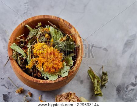 Spa Still Life With Flowers In Wooden Bowl On Light Textured Background, Top View, Close-up, Selecti