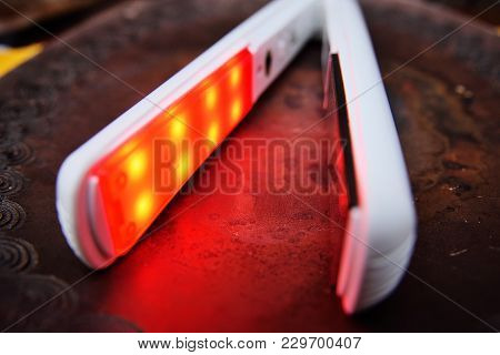 Included Curling Iron Or Styler Closeup On Vintage Background