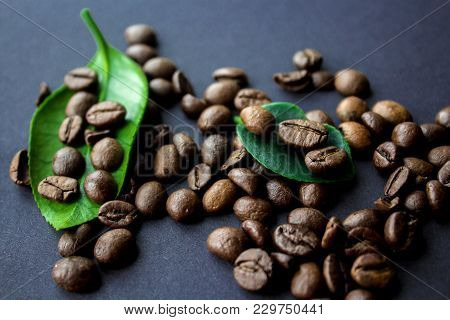 Coffe Beans And Green Leaf