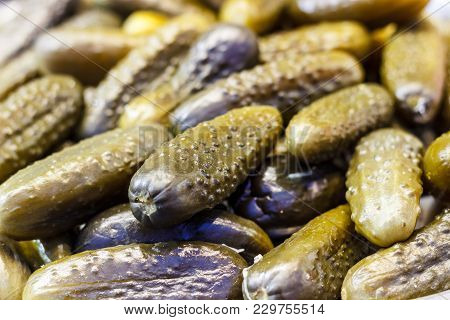 Close-up Of Pickled Green Cucumbers With Dill And Spices