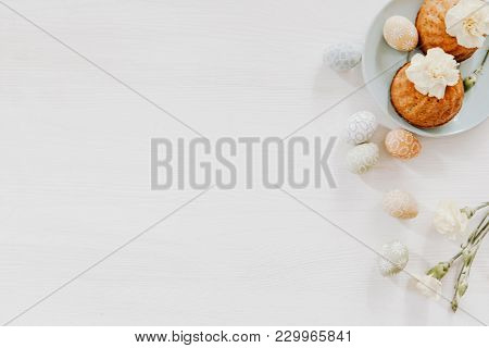 Simple, Pastel Decoration With Cupcakes On Plate And Little Colorful Eggs With Yellow Gillyflowers