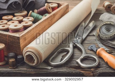 Sewing Items: Retro Tailoring Scissors, Measuring Tape, Thimble, Vintage Spools Of Thread In Wooden 