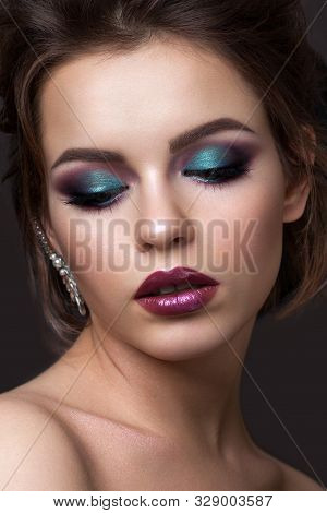 Beautiful Young Girl With Evening Colorful Makeup And Half Closed Eyes. Color Lipstick With Metall E