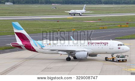 Airplane Taxi In Dusseldorf Airport