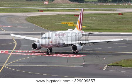 Airplane Taxi In Dusseldorf Airport