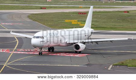 Airplane Taxi In Dusseldorf Airport