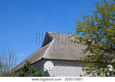 The Roof Of The House Is Made Of Slate. Old Slate On The Roof
