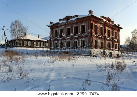 Abandoned Historical Residential House In Winter. Village Of Visim, Sverdlovsk Region, Low Middle Ur