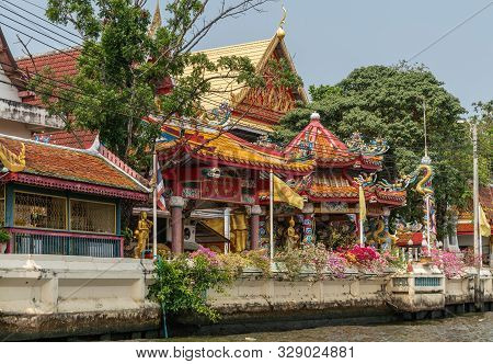 Bangkok City, Thailand - March 17, 2019: Bangkok Noi Canal. Abundantly Decorated Red And Gold Shrine