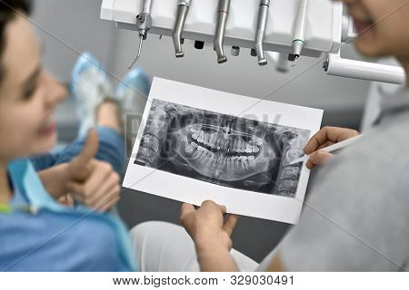 Pretty Womans Teeth Treatment In Dental Clinic