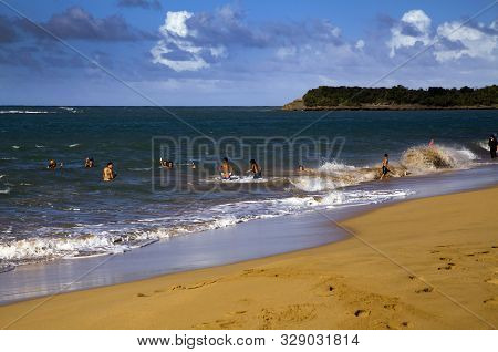 Pinones, Puerto Rico/usa - February 10, 2019: Beach Swimmers Enjoy The Beach Water On The Northeast 