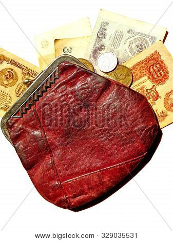 Old Leather Wallet With Soviet Paper Bills And Metal Coins On White Background. Closeup. Retro. Bank