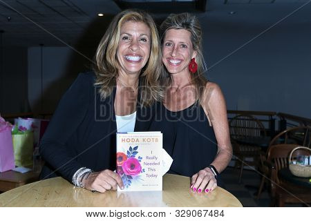 HUNTINGTON, NY - OCT 15: Hoda Kotb sign copies of her book 