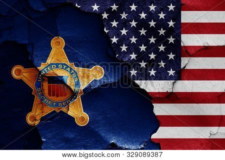 Flags Of United States Secret Service And Usa Painted On Cracked Wall