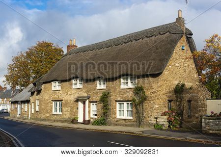 Oakham, United Kingdom. October 19, 2019 - English Traditional Orange Brick Wall Building.