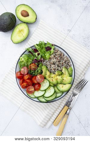 Healthy Food. Budha Bowl With Quinoa, Avocado, Cucumber, Salad, Tomatoe, Olive Oil Clean Eating Diet