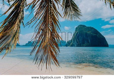 Huge Rock Of Pinagbuyutan Island In Blue Ocean. Landscape Of El Nido. Palawan Island. Philippines