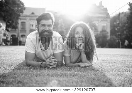 Adding Some Romance. Holiday Romance Of Bearded Man And Sexy Woman. Couple In Love Relaxing On Green