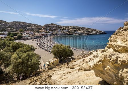 The Sea Coast And Mountains Of Matala On A Clear Summer Sunny Day. Crete, Greece.