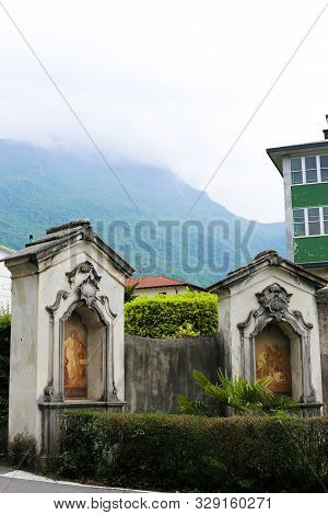 Old Christian Icon Fresco Near Church In Mandello Del Lario, Italy.