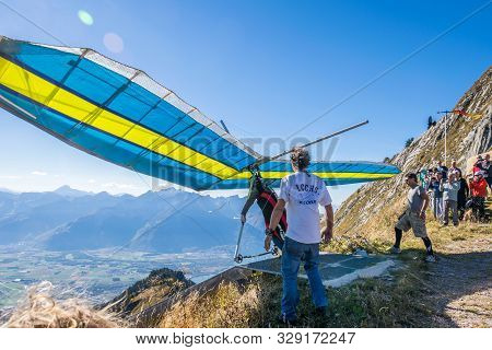 Rochers-de-naye, Canton Of Vaud, Switzerland - October 13, 2018: Hang-gliders In Swiss Alps From Top