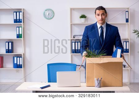 Young employee being made redundant