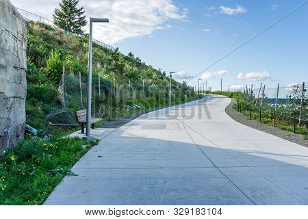 A Wide Walkway Rises Up To The Wilson Way Brdige In Tacoma, Washington.
