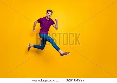 Full Length Body Size Phoo Of Cheerful Brown Haired Attractive Man Wearing Blue Pants Trousers Purpl
