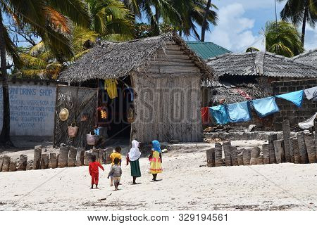 Pingwe, Zanzibar - October 6, 2019: Group Of Children In The Pingwe Village. Tanzania, Africa