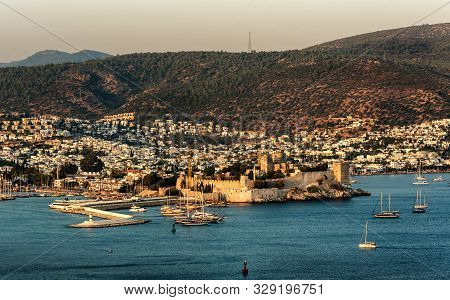 Panoramic Sunset View Of Bodrum Castle And Marina Bay On Turkish Riviera. Bodrum Is A 

District And