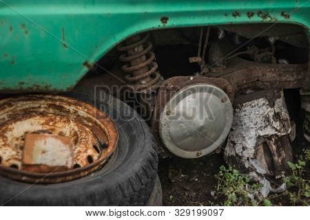 Dump of old abandoned Soviet rusty cars. Russian auto industry.
