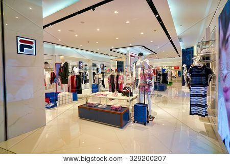 SHENZHEN, CHINA - CIRCA APRIL, 2019: interior shot of Fila store at a shopping mall in Shenzhen. Fila is an Italian sporting goods brand and company.