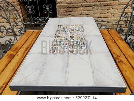 Tbilisi, Georgia - Murch 29 2019: The  Cafe In The Old Tbilisi, Table With Ornaments. The Restored A