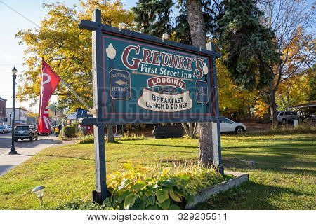 Bayfield, Wisconsin - October 19, 2019: Sign For Greunkes First Street Inn, A Famous And Popular Res