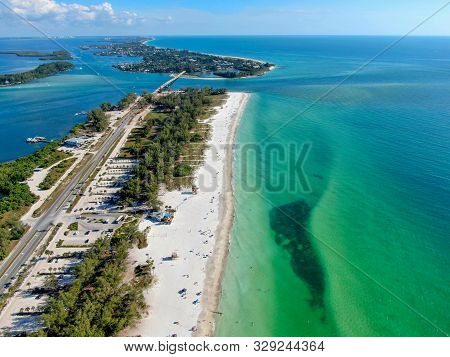 Aerial View Of Coquina Beach With White Sand Beach And The Main Road, Anna Maria Island, Florida. Us