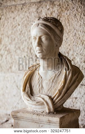 Athens, Greece - April, 2018: Portrait Bust Of A Roman Matron At The Stoa Of Attalos In Athens