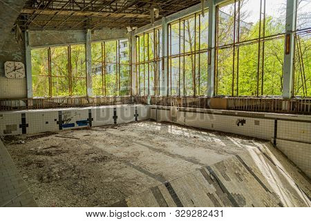 Chernobyl zone. Swimming pool in the city of Pripyat in Ukraine. Exclusion Zone.