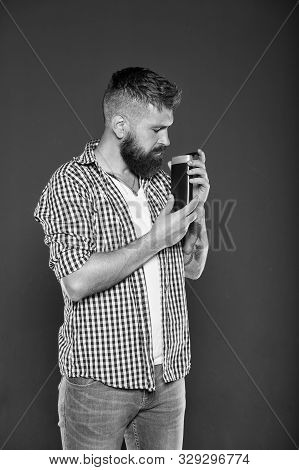 Man Hold Shampoo Bottle. Hair Care And Skincare. Handsome Bearded Guy Recommend Shower Gel Liquid So