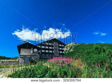 Bulgaria, Dobrinishte - 20 June 2019: Chalet Bezbog At The Balkan Pirin Mountains.